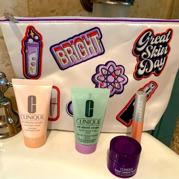 Clinique Other - Clinique BUNDLE 4 facial products and makeup pouch